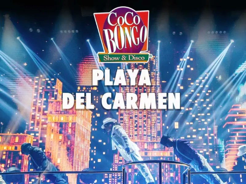 Coco Bongo Playa del Carmen - Artistas em palco com luzes vibrantes durante o espetáculo noturno